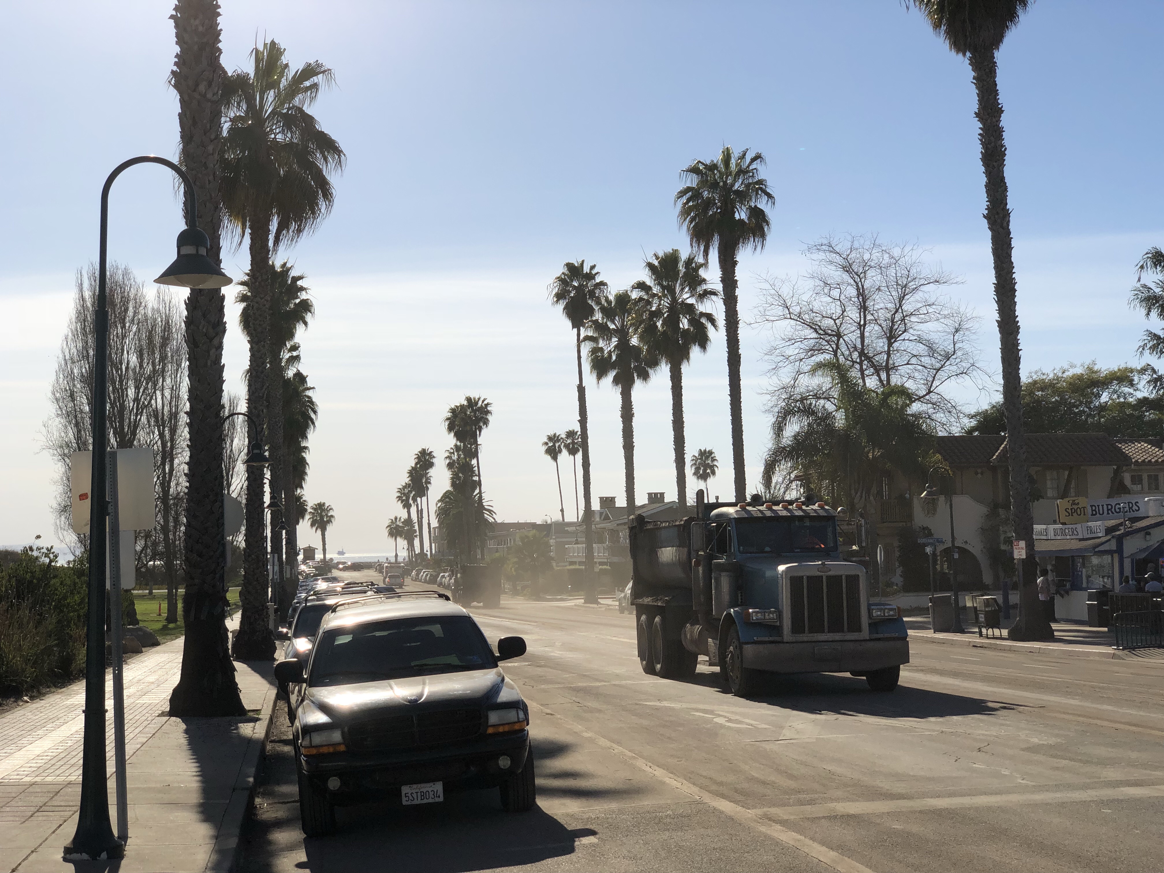 Two trucks hauling mud from Montecito to the ocean in Carpinteria. 
